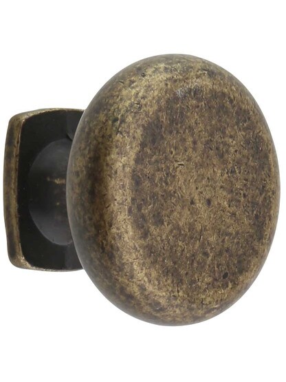 Belcastel Flat-Bottom Cabinet Knob - 1 3/8 inch Diameter in Distressed Antique Brass.
